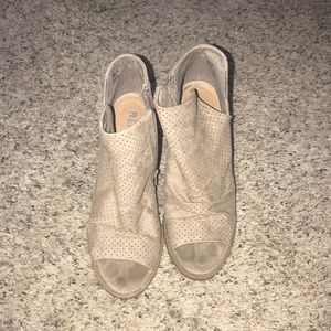 Perforated peep toe booties